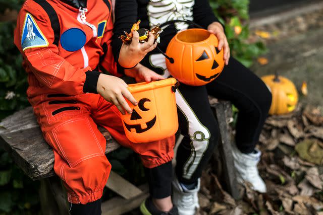 <p>Getty</p> Stock photo of children with Halloween candy