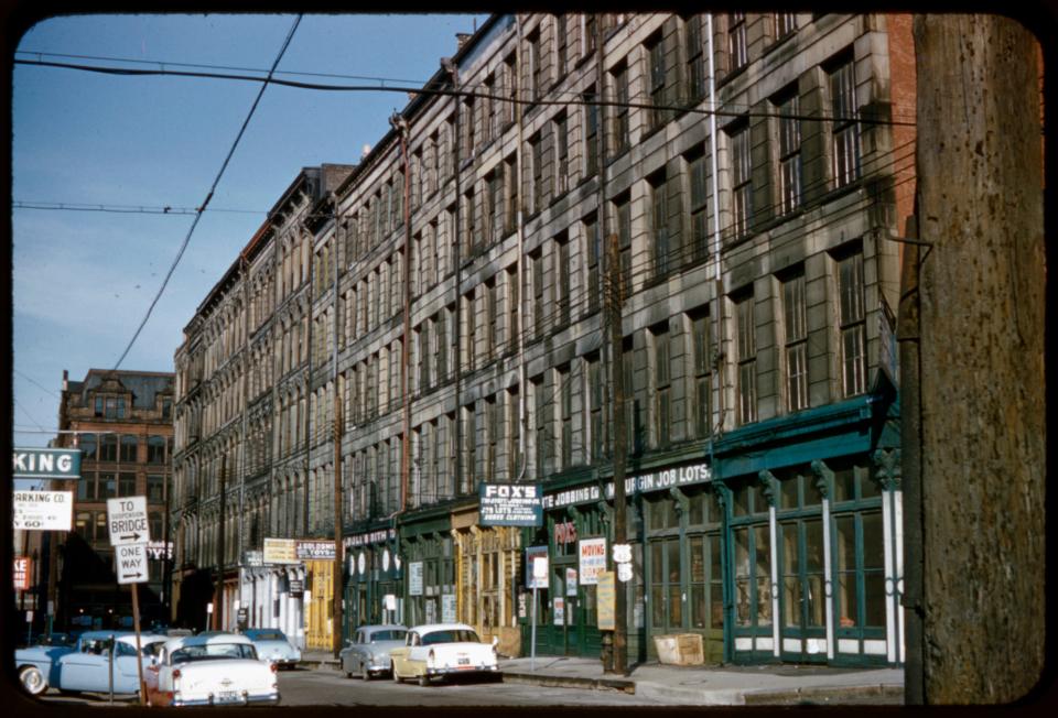 Looking west from the intersection of Vine and Pearl streets. Pearl was lost to the riverfront development. But at one time, it was the location of Kroger's first food market.