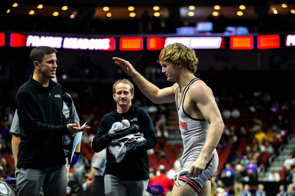 Linn-Mar's Tate Naaktgeboren reacts after his match at 182 pounds during the Class 3A high school boys state wrestling tournament semifinals, Friday, Feb. 17, 2023, at Wells Fargo Arena in Des Moines, Iowa.