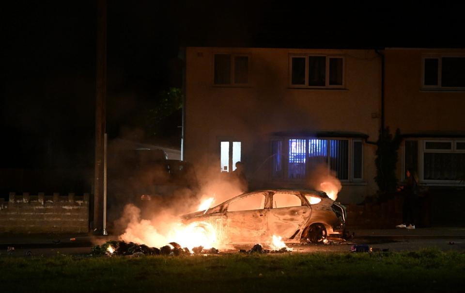 Large numbers of officers were called to the scene of the riot - GETTY IMAGES