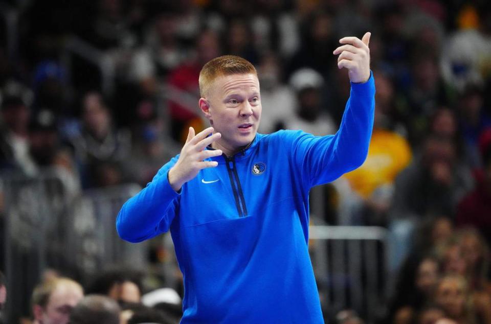 Dallas Mavericks assistant coach Sean Sweeney calls out in the second half against the Denver Nuggets at Ball Arena in Nov. 3, 2023.