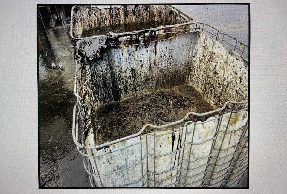 These totes contain material collected at C6-Zero, an asphalt shingle recycling business in Marengo, following a December explosion and fire. The photo was submitted to the Iowa Department of Natural Resources by EcoSource, a consultant that put together C6-Zero's environmental mitigation plan.