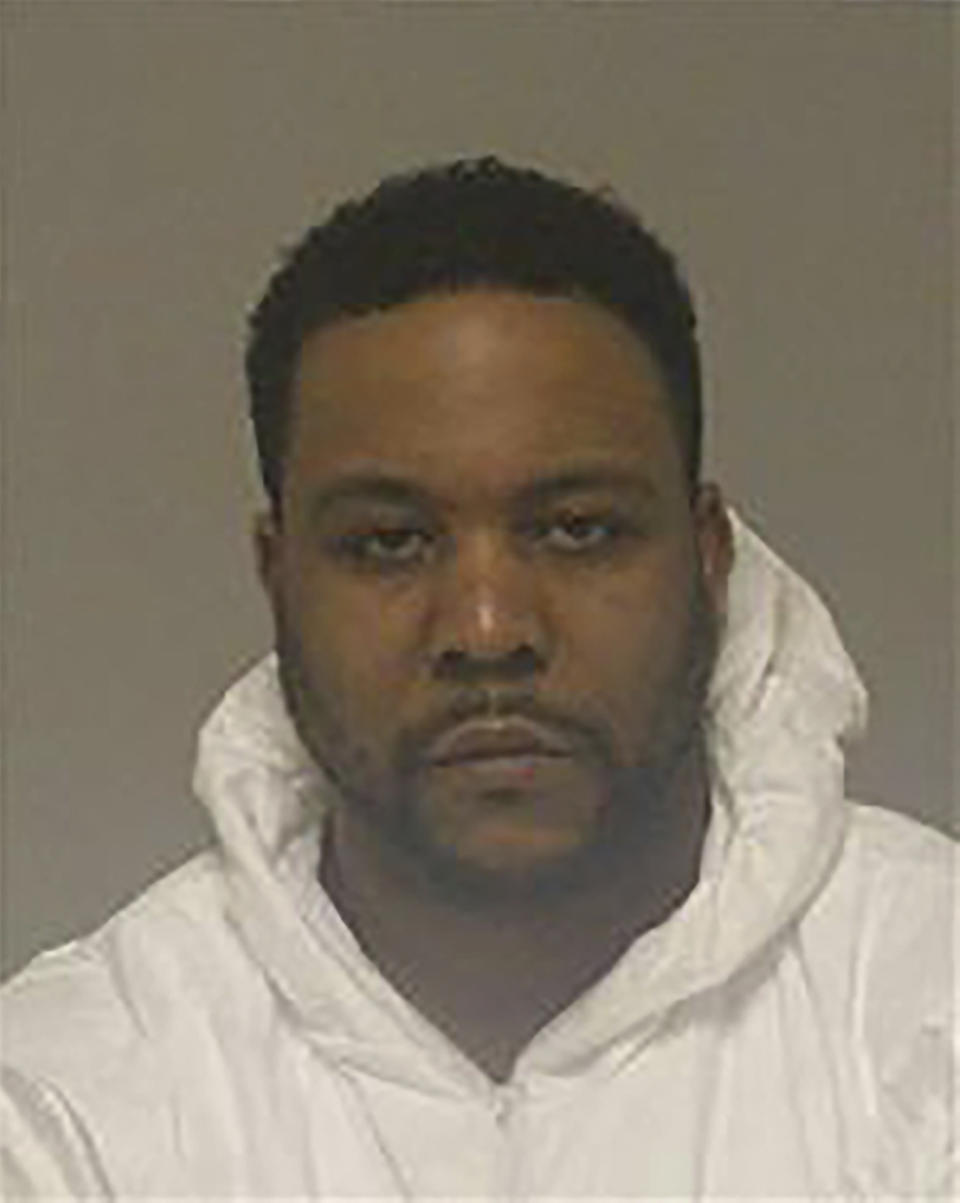 This photo released by the Anoka County, Minn., Jail shows inmate Alonzo Pierre Mingo. Mingo was charged with murder Monday, Jan. 29, 2024, after authorities say he posed as a package delivery driver, entered a home and demanded money before he shot three people in the head, including at least one at point-blank range. (Anoka County Jail via AP)