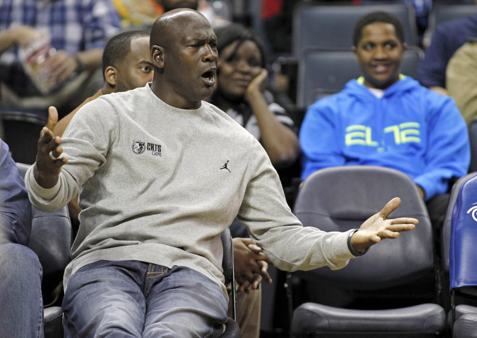 FILE - In this March 9, 2012, file photo, Charlotte Bobcats' owner Michael Jordan gestures at the referees during the first half of an NBA basketball game against the New Jersey Nets in Charlotte, N.C. Jordan's No. 23 has long been synonymous with greatness. By Thursday night, that number could have a completely different meaning. If Jordan's Charlotte Bobcats lose to the New York Knicks, it will be their 23rd consecutive loss and they'll finish the season with the worst winning percentage in NBA history.(AP Photo/Bob Leverone, File)