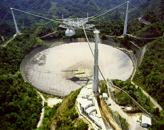 Astronomers will use the huge Arecibo Observatory, a radio telescope in Puerto Rico, to study the close flyby of Earth by the huge asteroid 2005 YU55 on Nov. 8, 2011.