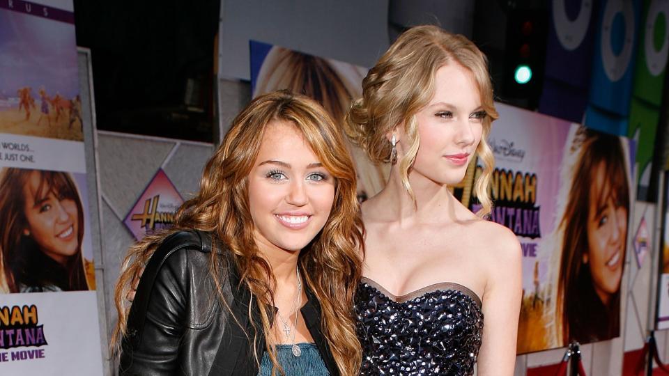 miley cyrus with taylor swift at the hannah montana movie premiere