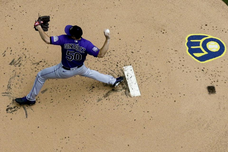 Colorado Rockies starting pitcher Chi Chi Gonzalez throws during the first inning of a baseball game against the Milwaukee Brewers Sunday, June 27, 2021, in Milwaukee. (AP Photo/Morry Gash)