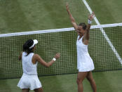 Czech Republic's Barbora Strycova, right, and Taiwan's Su-Wei Hsieh celebrate defeating Canada's Gabriela Dabrowski and China's Yifan Xu in the women's doubles final match of the Wimbledon Tennis Championships in London, Sunday, July 14, 2019. (AP Photo/Ben Curtis)