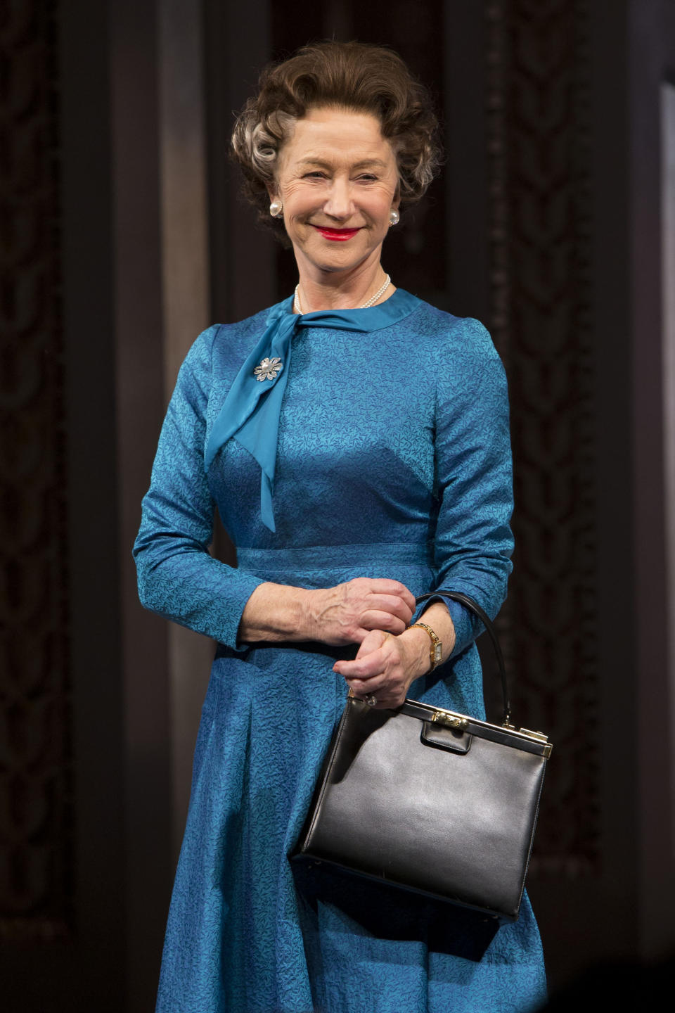 FILE - Helen Mirren appears on stage as Queen Elizabeth II at the Broadway opening night curtain call of "The Audience" on March 8, 2015, in New York. (Greg Allen/Invision/AP, File)