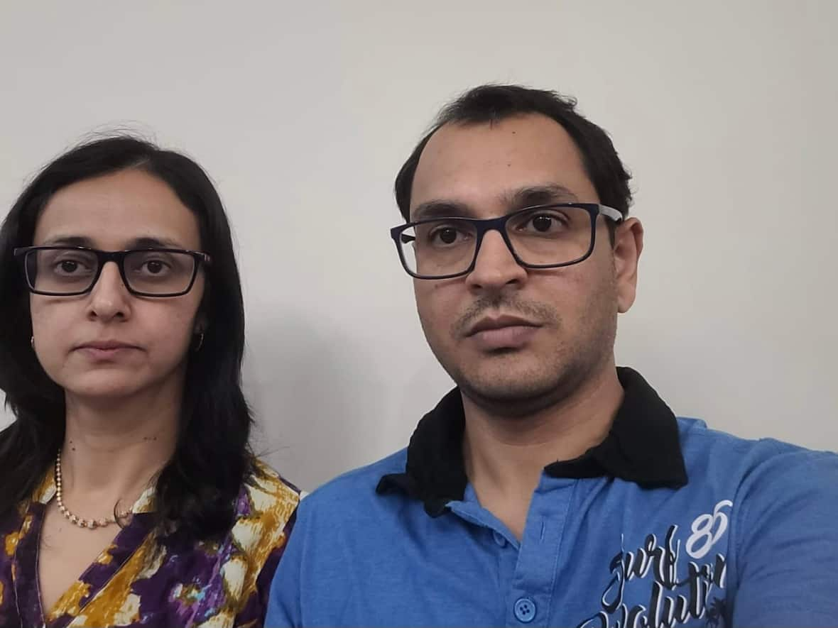 Over a dozen people, including Jignesh Padia and his wife Liza Parekh, thought they were getting a bivalent COVID booster shot at a Regina pharmacy, but instead got expired, monovalent vaccines. (Jignesh Padia - image credit)