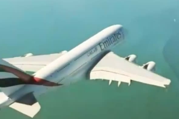 World's biggest passenger plane flies right under helicopter (video)