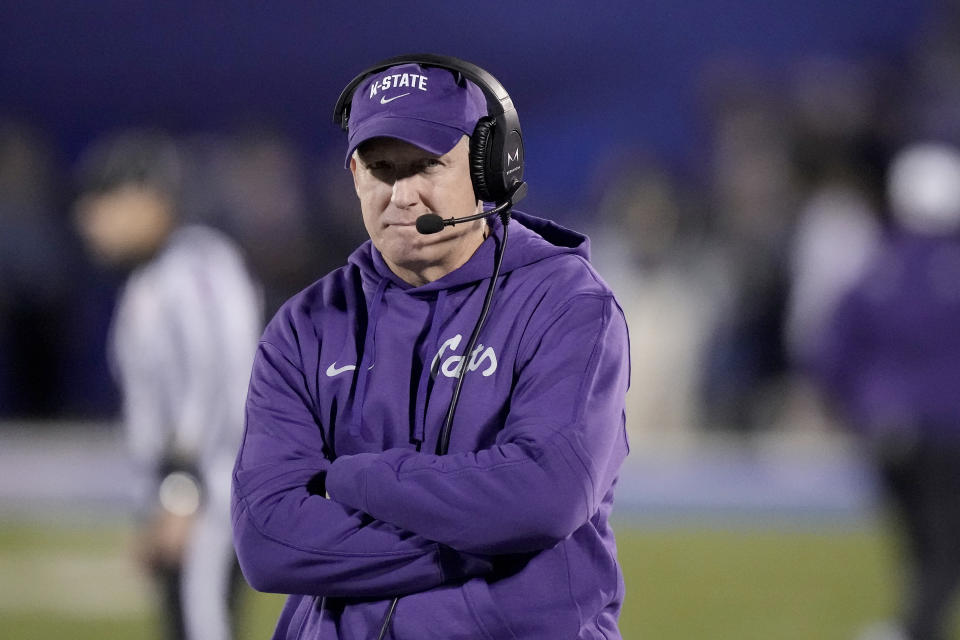 Kansas State head coach Chris Klieman watches during the first half of an NCAA college football game against Kansas Saturday, Nov. 18, 2023, in Lawrence, Kan. (AP Photo/Charlie Riedel)