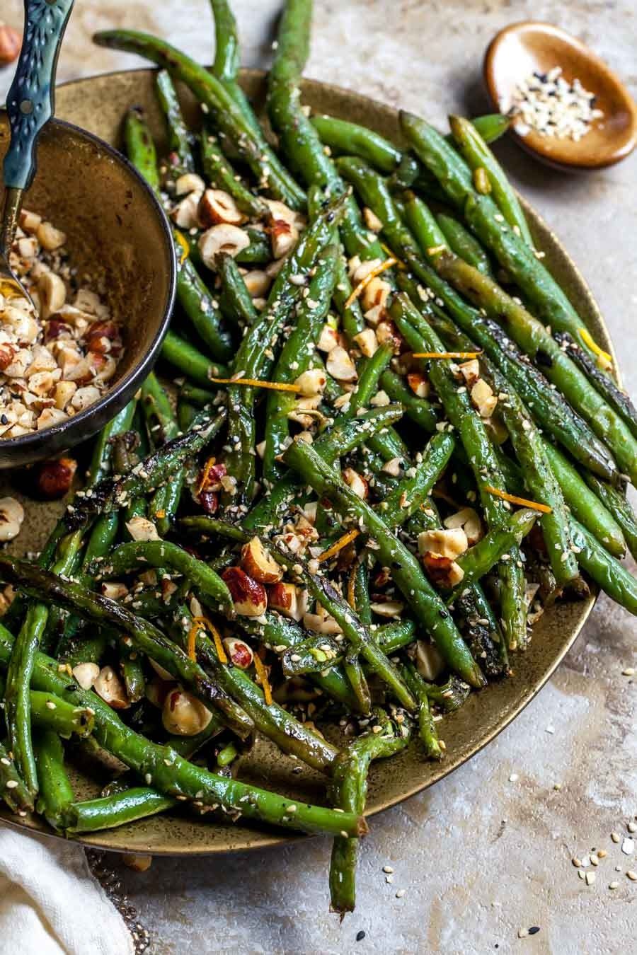 <p>For a 30-minute vegetarian and gluten-free green bean side dish, prepare this Middle Eastern-flavored side that will compliment your protein of choice. </p><p>Get the <a href="https://dishingouthealth.com/browned-butter-green-beans-with-hazelnut-dukkah/" rel="nofollow noopener" target="_blank" data-ylk="slk:Browned Butter Green Beans with Hazelnut Dukkah recipe;elm:context_link;itc:0;sec:content-canvas" class="link "><strong>Browned Butter Green Beans with Hazelnut Dukkah recipe</strong></a>.</p>