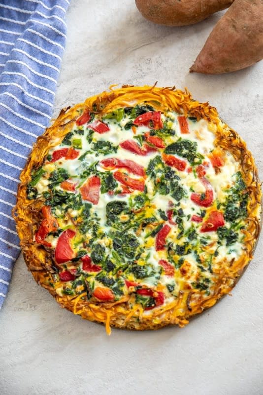 <p>A Mind "Full" Mom</p><p>This spinach quiche made with a sweet potato crust is a healthy, gluten-free, delicious, way to serve up brunch!</p><p><strong>Get the recipe: <a href="https://amindfullmom.com/spinach-quiche-with-sweet-potato-crust/" rel="nofollow noopener" target="_blank" data-ylk="slk:Sweet Potato Crust Quiche;elm:context_link;itc:0;sec:content-canvas" class="link rapid-noclick-resp"><em>Sweet Potato Crust Quiche</em></a></strong></p>