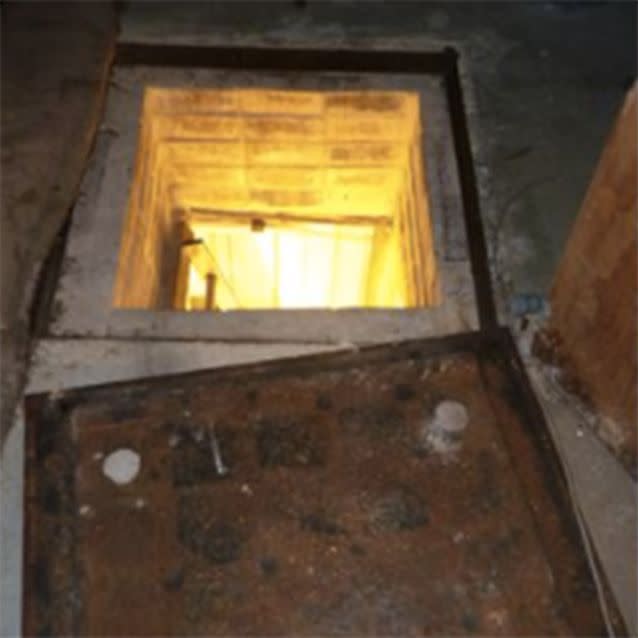 There was a manhole in the ground that lead to the bunker. Photo: SA Police