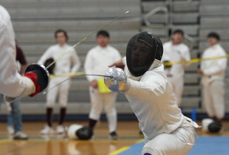 Randolph, NJ -- January 13, 2024 -- Pearce Lally of Chatham competes at the Morris County Fencing Tournament held at Randolph.