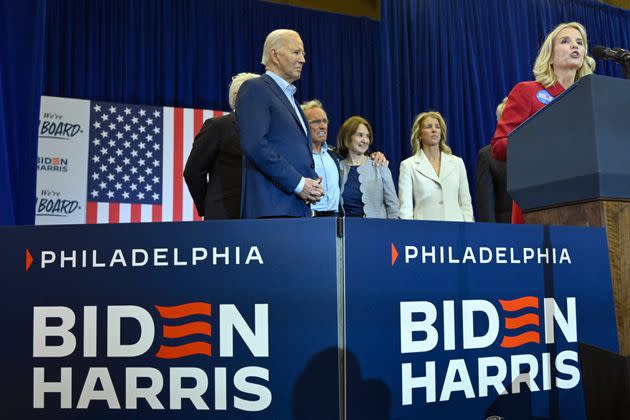 President Joe Biden listens to Kerry Kennedy (R) as she and members of the Kennedy family endorse his presidential campaign, at Martin Luther King Recreation Center in Philadelphia, Pennsylvania, on April 18, 2024. 