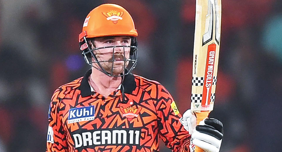 Seen here, Travis Head raises his bat after another IPL half century for the Sunrisers Hyderabad. 