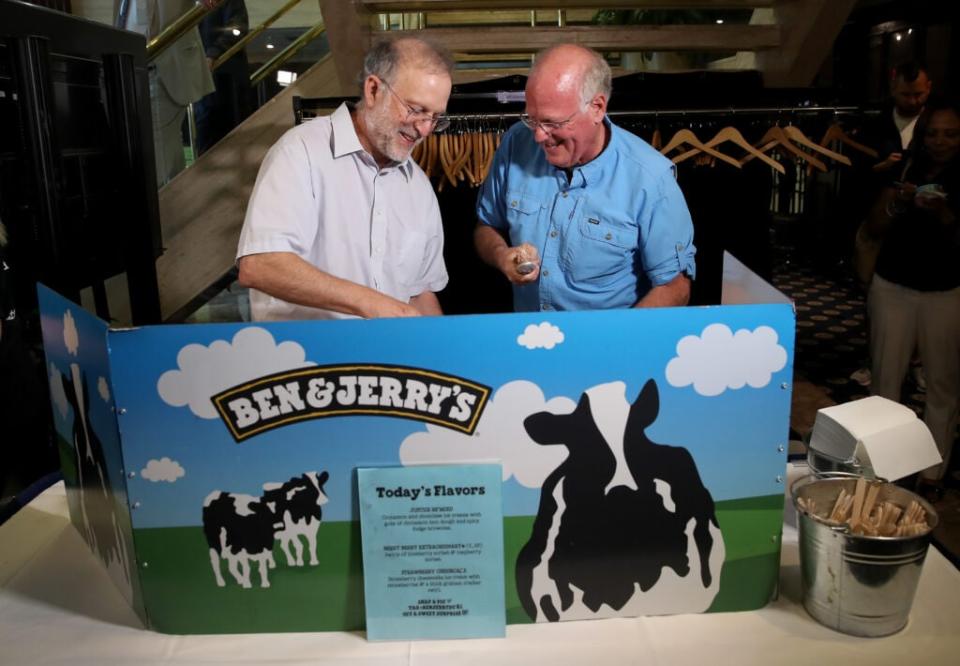 Ben & Jerry’s co-founders Ben Cohen (R) and Jerry Greenfield (L) serve ice cream following a press conference announcing a new flavor, Justice Remix’d, September 03, 2019 in Washington, DC. Ben & Jerry’s launched the new flavor in conjunction with the civil rights organization, Advancement Project, to “spotlight structural racism in a broken criminal legal system”. (Photo by Win McNamee/Getty Images)