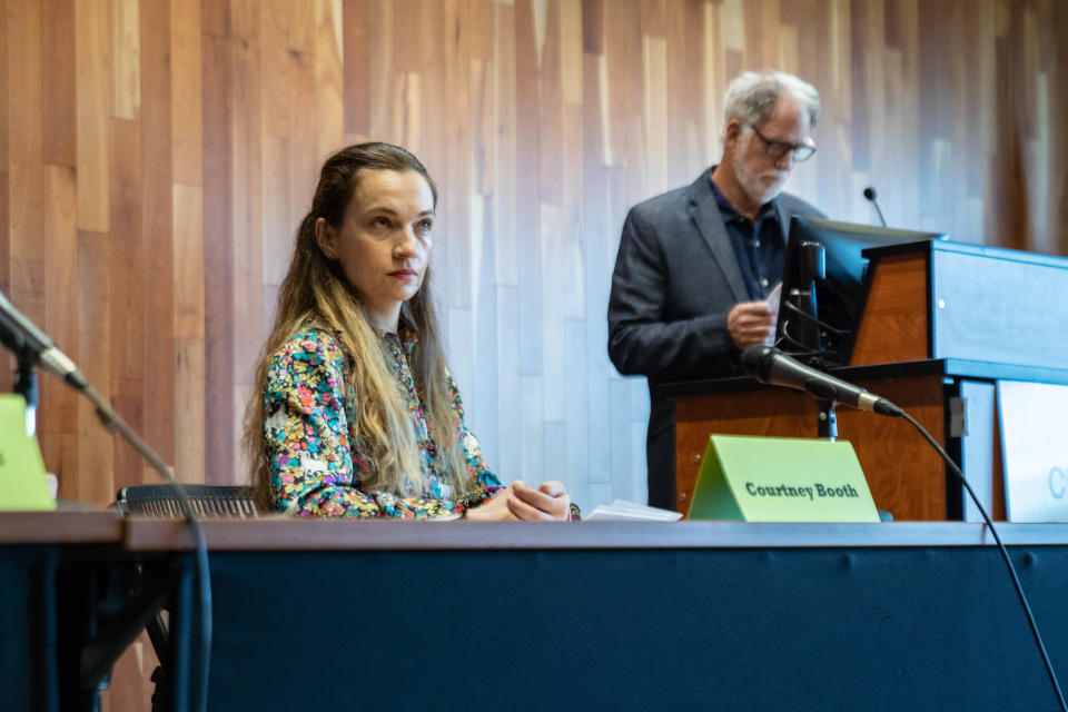 Buncombe County district attorney candidate Courtney Booth answered questions submitted by business owners at a Council of Independent Business Owners meeting on April 1, 2022.