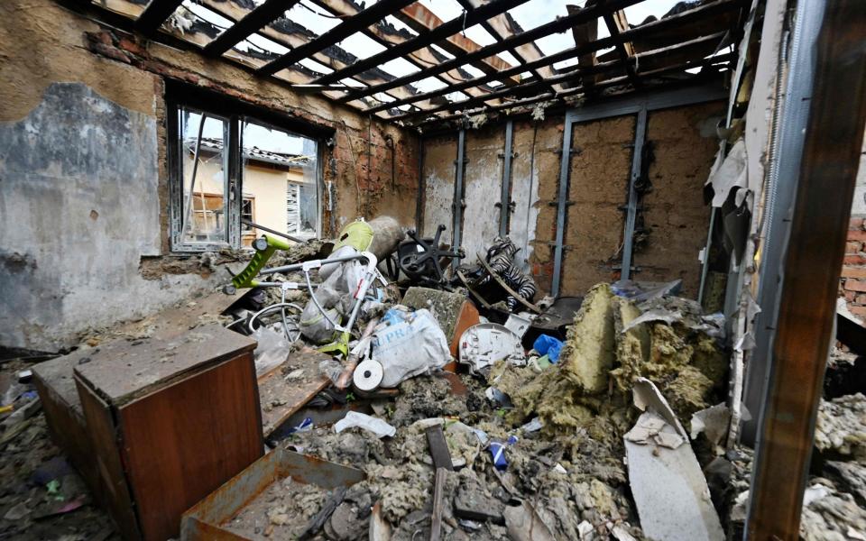 A destroyed residential house following a strike in the village of Tsirkuny, Kharkiv region - SERGEY BOBOK/AFP