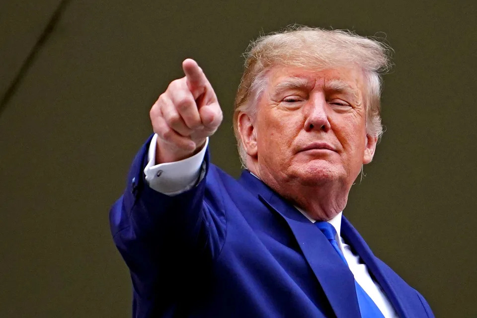 May 7, 2022; Louisville, KY, USA; Former President Donald Trump waves to the crowd  before the 148th running of the Kentucky Derby at Churchill Downs. Mandatory Credit: Peter Casey-USA TODAY Sports