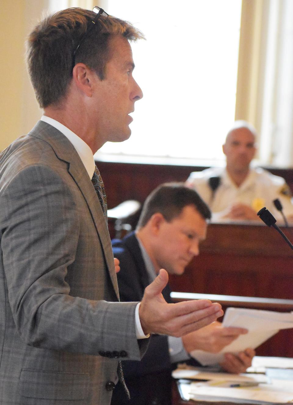Fall River Corporation Counsel Alan Rumsey, with Gannett attorney Zachary Kleinsasser in the background, speaks to Bristol County Superior Court Judge Renee Dupuis in Bristol County Superior Court in August.