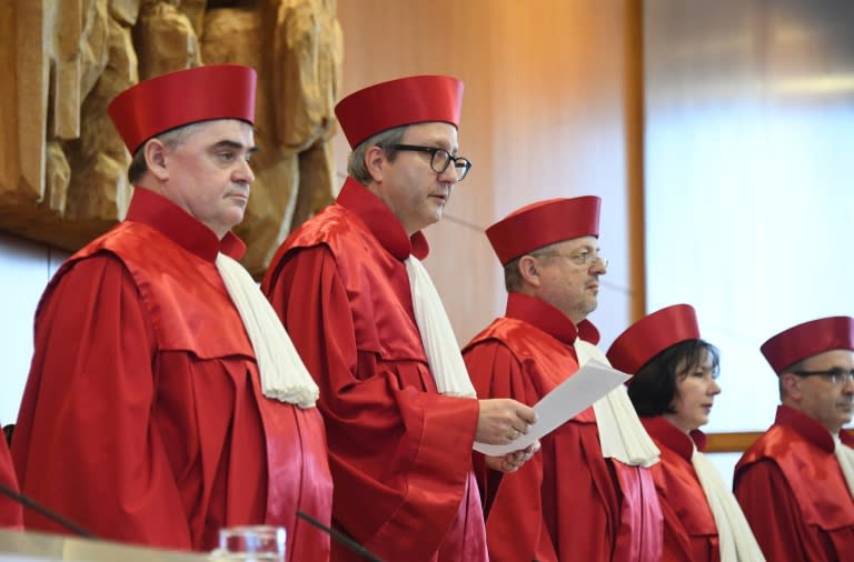 Top judge Andreas Vosskuhle (2nd left) delivers the verdict of the Federal Constitutional Court in Karlsruhe, southwestern Germany, on January 17, 2017