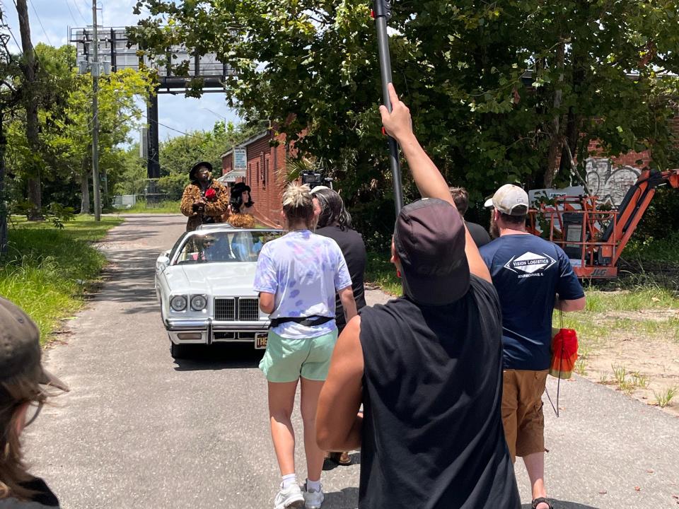 A team works to capture a scene for Whole Wheat Bread's new music video during a July 30, 2022 shoot.