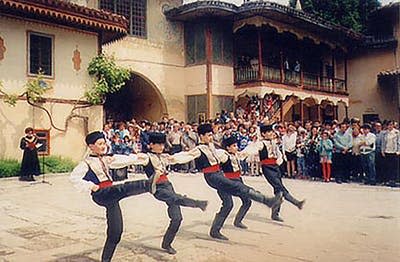 <span class="caption">Young boys doing a traditional dance during a Crimean Tatar wedding in the court of the Crimean Khans in Bakchesaray.</span> <span class="attribution"><span class="source">Brian Glyn Williams.</span>, <a class="link " href="http://creativecommons.org/licenses/by/4.0/" rel="nofollow noopener" target="_blank" data-ylk="slk:CC BY;elm:context_link;itc:0;sec:content-canvas">CC BY</a></span>