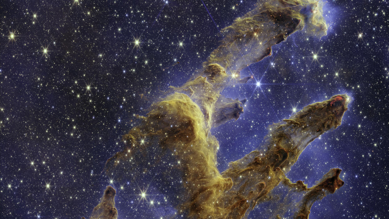  The James Webb Space Telescope's view of the iconic Pillars of Creation is full of sparkling new-born stars. 