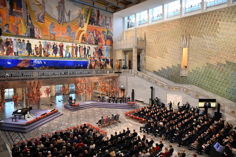 Memorial chairman Yan Rachinsky on behalf of 2022 Nobel Peace Prize winner Russian human rights organisation Memorial delivers a speech during the 2022 Nobel Peace Prize award ceremony at the City Hall in Oslo, Norway, on December 10, 2022. (Photo by SERGEI GAPON / AFP)