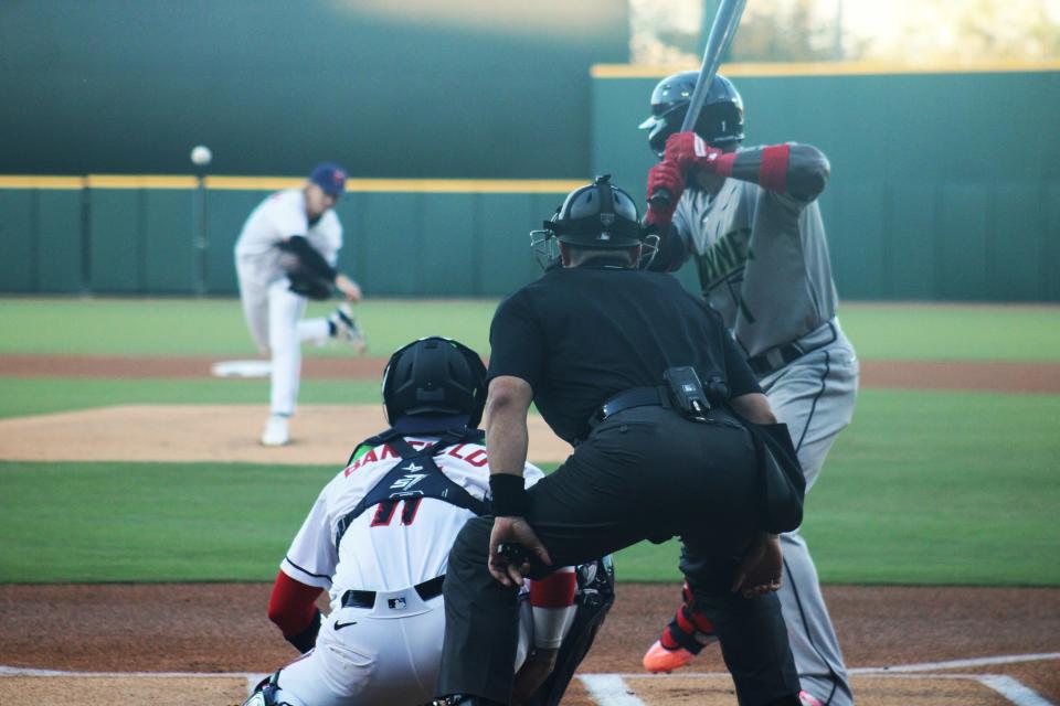 Jacksonville Jumbo Shrimp pitcher Darren McCaughan delivers a pitch to Gwinnett Stripers leadoff man J.P. Martinez during Opening Day.