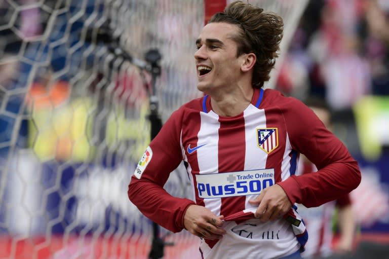 Atletico Madrid's forward Antoine Griezmann celebrates a goal during the Spanish league football match Club Atletico de Madrid vs Valencia CF at the Vicente Calderon stadium in Madrid on March 5, 2017