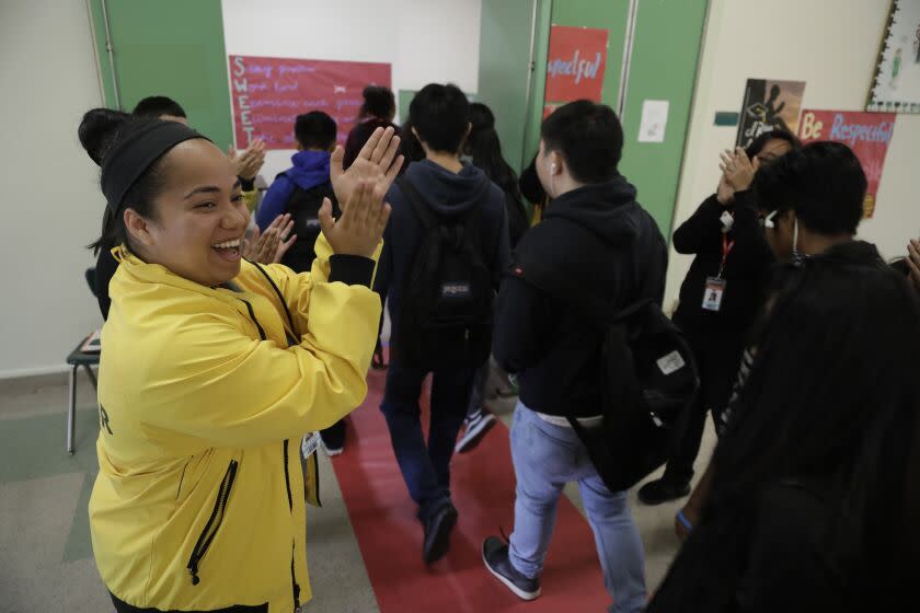 Myung J. Chun  Los Angeles Times STUDENTS at Belmont High in Los Angeles are cheered on as they prepare to take the SAT exam in April. The tests are increasingly seen as an unfair barrier to students who don't test well or struggle financially.
