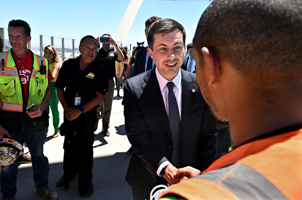 Los Angeles, California July 7, 2022-U.S. Transportation Secretary Pete Buttigieg, speaks meets construction workers after a press conference at LAX Thursday. (Wally Skalij/Los Angeles Times via Getty Images)