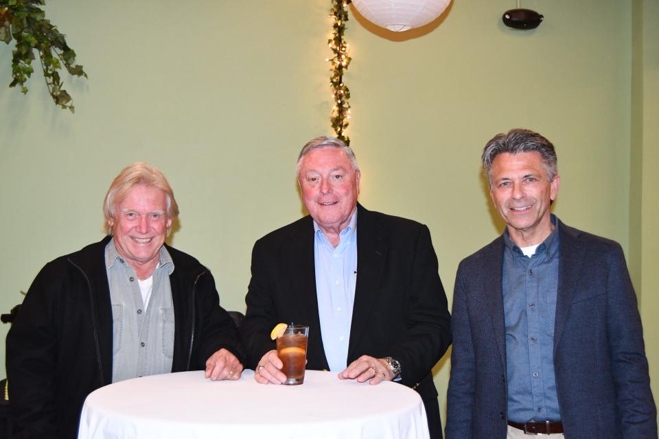 From left, Republicans Charles Schwochow, Russ Zimmerman and Scott Miller attend the Sandusky County Republican Party's election night watch party Tuesday night at Moonshine Nightclub.