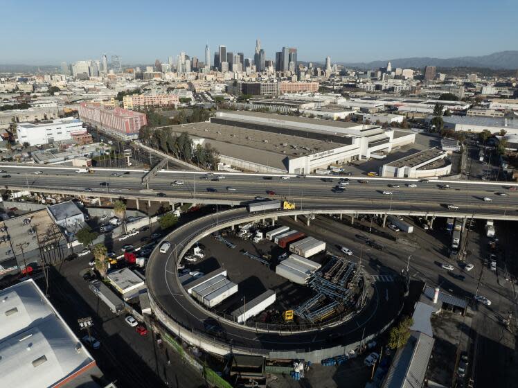 LOS ANGELES, CA - NOVEMBER 20: Monday morning commuters drive on the reopened portion of the 10 Freeway in downtown on Nov. 20, 2023 in Los Angeles, CA. The section reopened Sunday night around 7 p.m. (Myung J. Chun / Los Angeles Times)