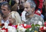 Armenian opposition leader Nikol Pashinyan attends a ceremony to commemorate the 103rd anniversary of mass killing of Armenians by Ottoman Turks, at the Tsitsernakaberd Memorial Complex in Yerevan, Armenia April 24, 2018. REUTERS/Gleb Garanich