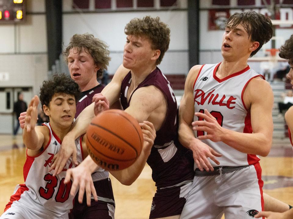 Red Bank's Liam Stack battles for loose ball with Robbinsville players in an NJSIAA Central Group 3 Quarterfinal game in Red Bank on February 27, 2024.