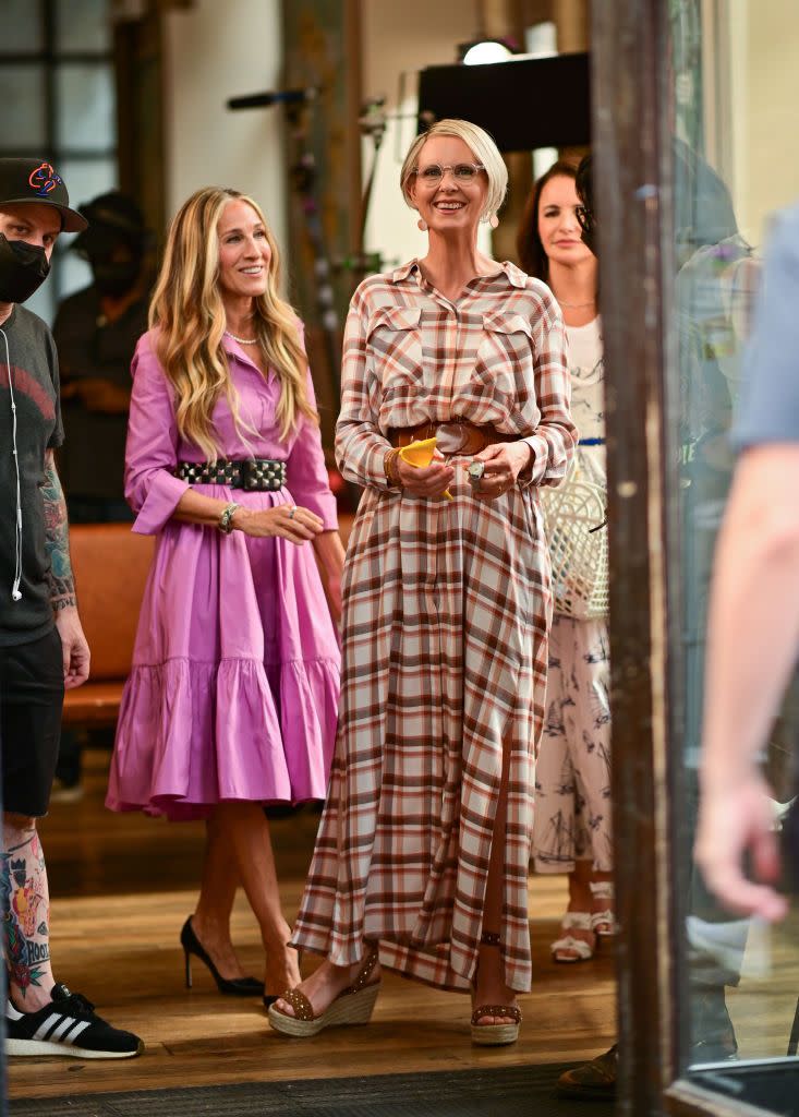 <p>With Charlotte in Emilia Wickstead and Carrie in Carolina Herrera, Miranda wore a plaid L'Agence shirt dress paired with Maje studded wedge sandals (spotted by <a href="https://www.instagram.com/thetvshowcloset/" rel="nofollow noopener" target="_blank" data-ylk="slk:@thetvshowcloset;elm:context_link;itc:0;sec:content-canvas" class="link ">@thetvshowcloset</a>) for her lunch date with her two best pals. </p><p><a class="link " href="https://www.selfridges.com/GB/en/cat/maje-fardane-studded-leather-wedge-sandals_R03735989/" rel="nofollow noopener" target="_blank" data-ylk="slk:SHOP NOW;elm:context_link;itc:0;sec:content-canvas">SHOP NOW</a> Fardane studded leather wedge sandals in black, £199.20<br></p>