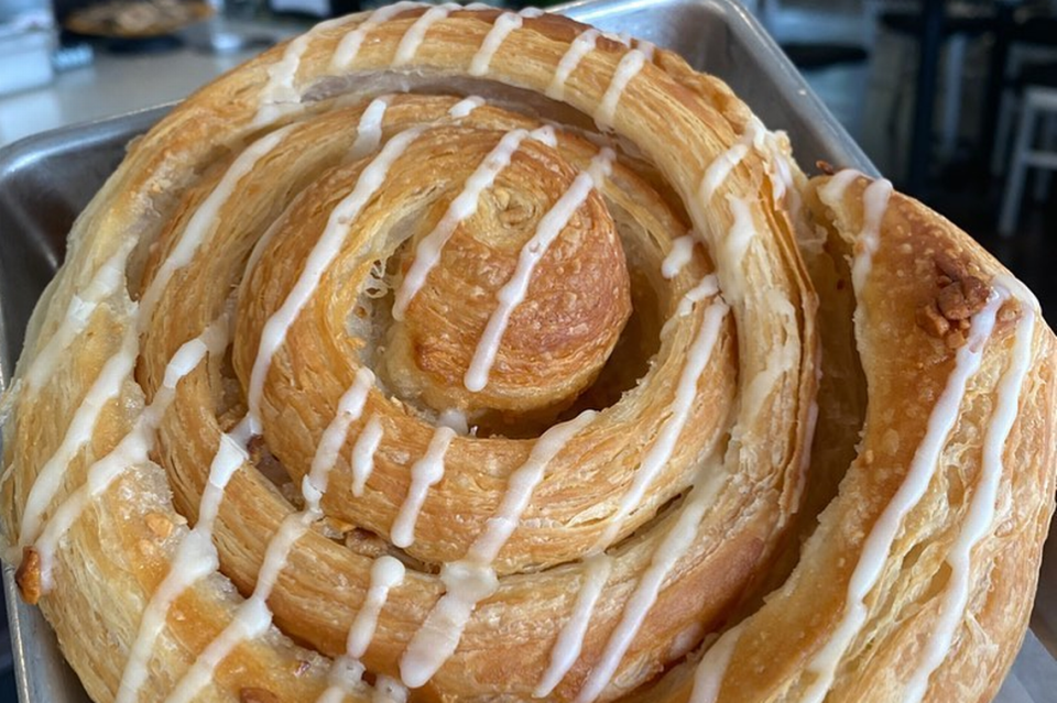 Sunflour’s delicate hazelnut orange roll is made with a flaky croissant dough.