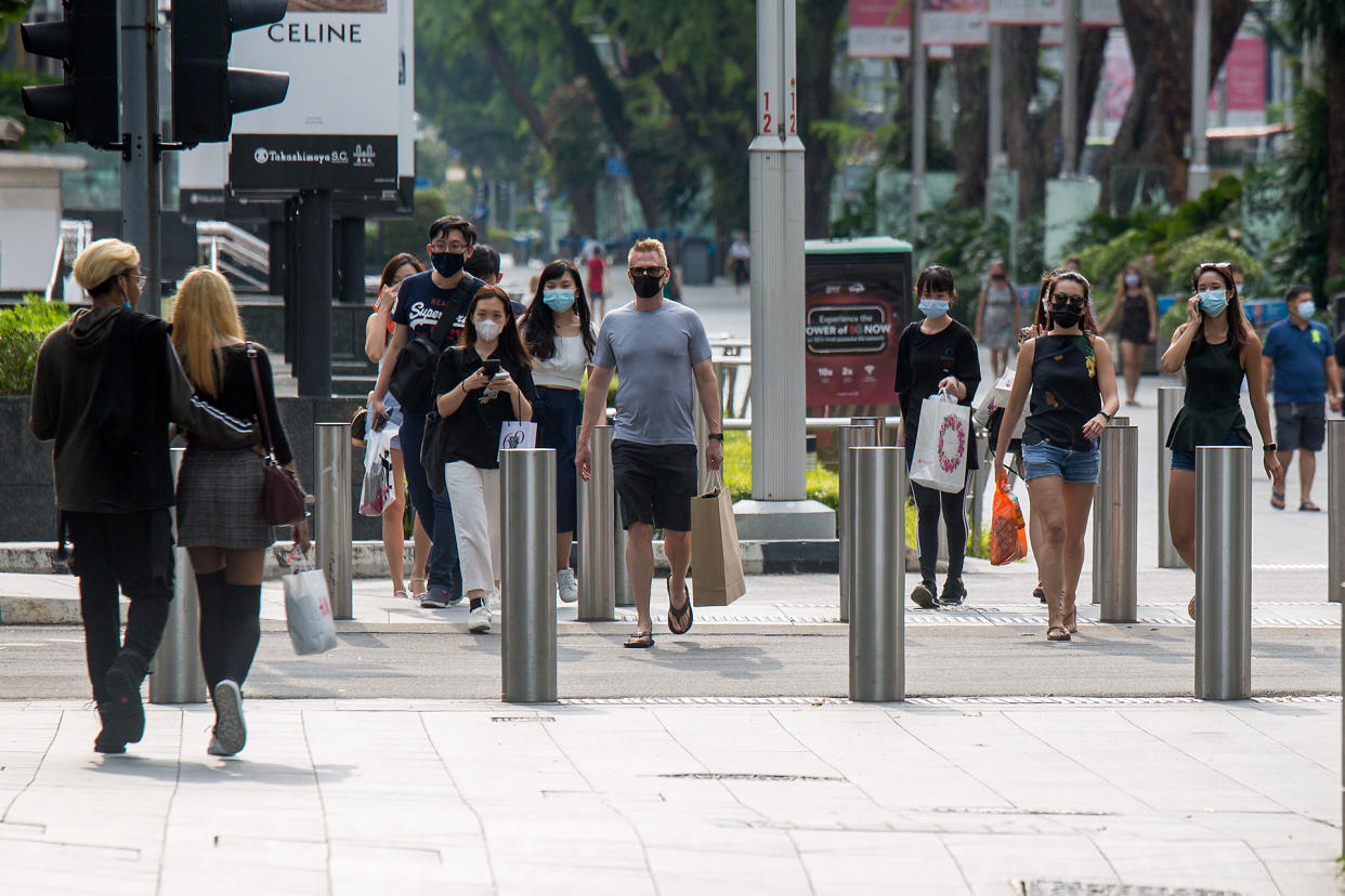 People seen along Orchard Road on 24 May 2021 amid Singapore's Phase 2 (Heightened Measures) period. (PHOTO: Dhany Osman / Yahoo News Singapore)