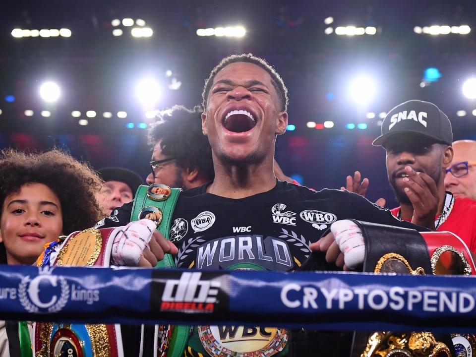 Haney celebrates becoming undisputed lightweight champion (EPA)