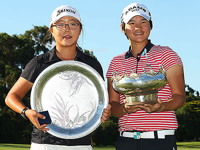 Lydia Ko poses with the amateur trophy after winning the Women's Australian Open at The Commonwealth Golf Club in 2011.