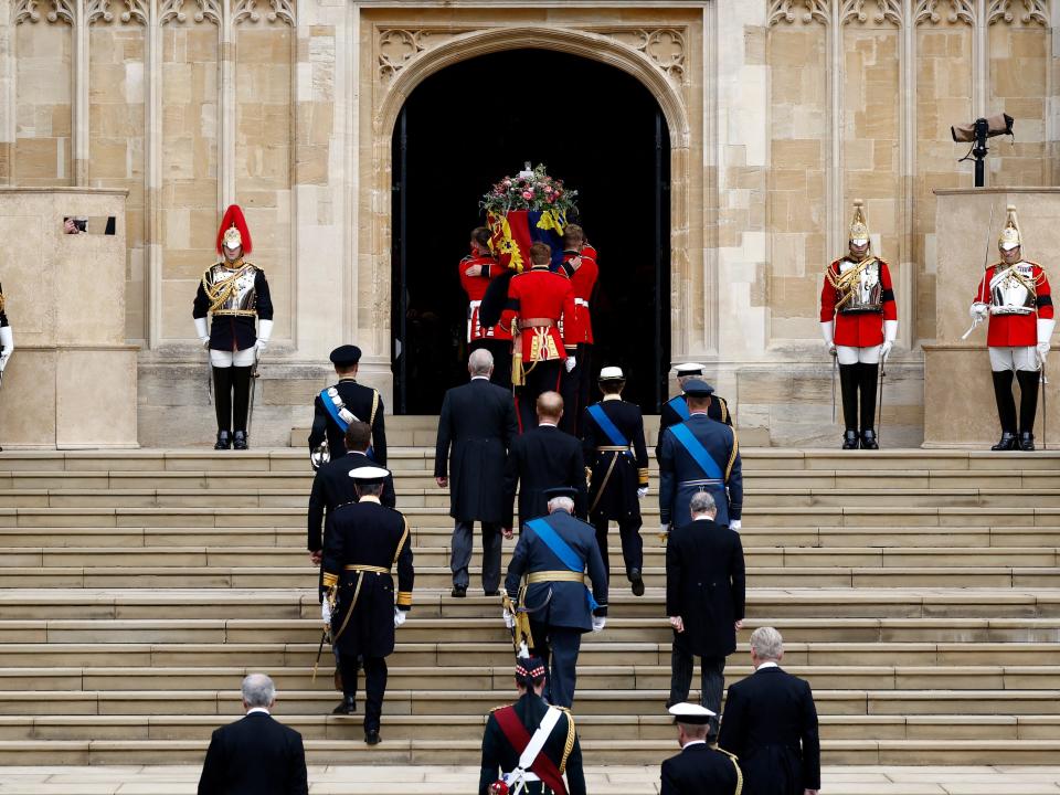 the queen's coffin being brought into st. George chapel at Windsor castle