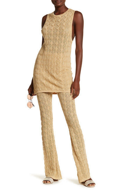 Get the matching set <a href="https://www.nordstromrack.com/shop/product/2166618/free-people-sleeveless-tank-metallic-knit-pants-2-piece-set?color=GOLD" target="_blank">here</a>.