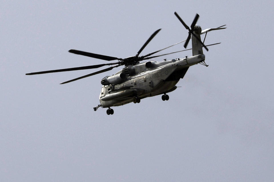 A Marine CH-53E Super Stallion helicopter flies during training at Marine Corps Air Station Miramar in San Diego, Tuesday, Feb. 6, 2024. A Marine Corps helicopter, like the one pictured, that had been missing with five troops aboard as an historic storm continued drenching California was found Wednesday morning, Feb. 7, 2024, in a mountainous area outside San Diego.(K.C. Alfred/The San Diego Union-Tribune via AP)