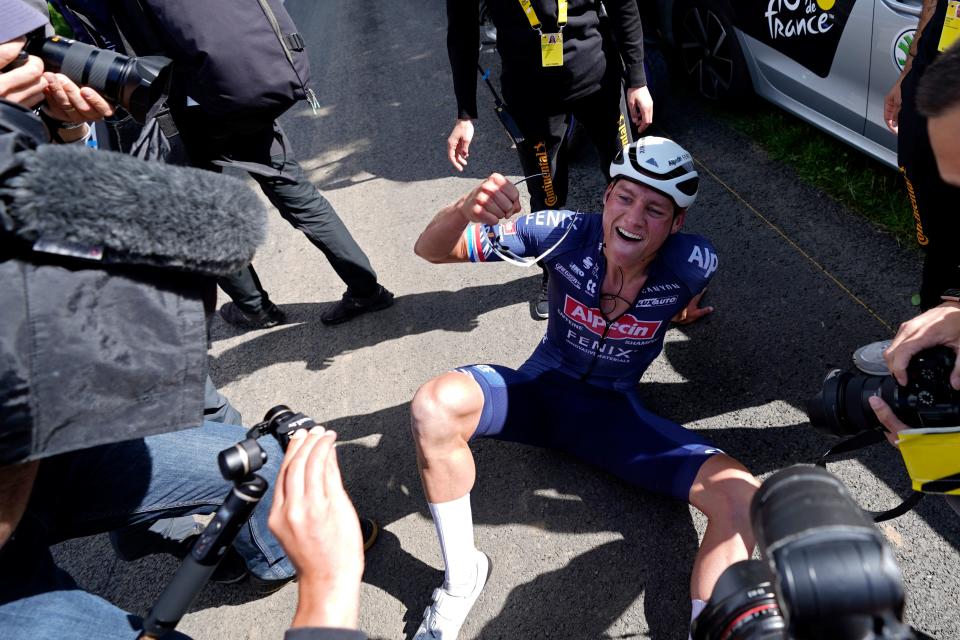 Seen here, Mathieu van der Poel celebrates after winning stage 2 of the 2021 Tour de France. 