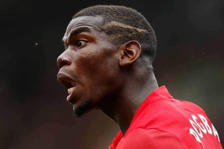 Manchester United's Paul Pogba shouts at the linesman during an English Premier League football match against Watford in Watford north of London on September 18, 2016